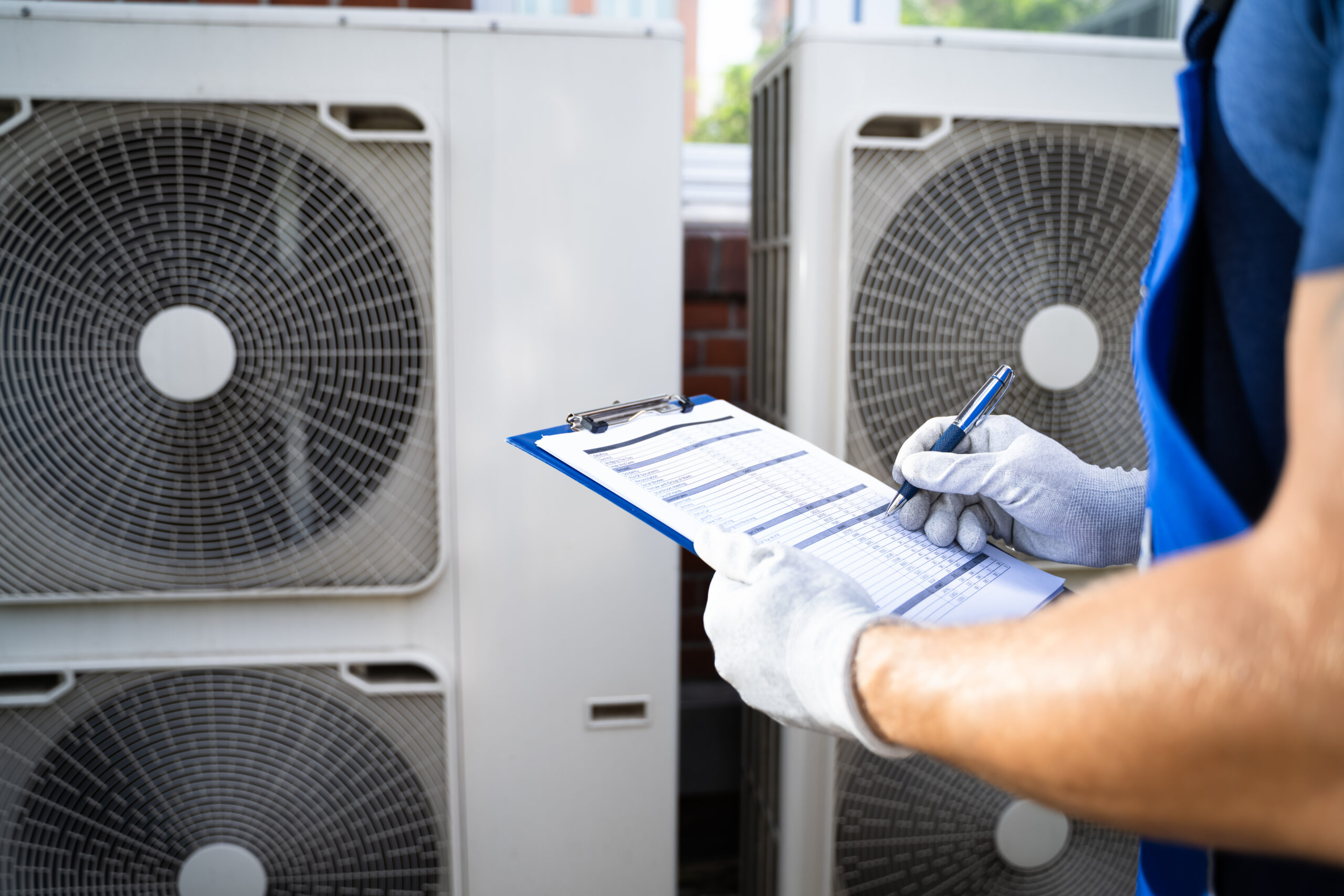 An Electrician Men Checking Air Conditioning Unit HVAC Service Solutions Logo